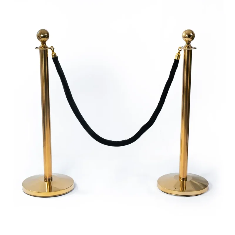 Golden poles & black rope